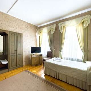 Гостиница Юрьево Подворье Вельск Комната для двоих (удобства в блоке) №6б-1